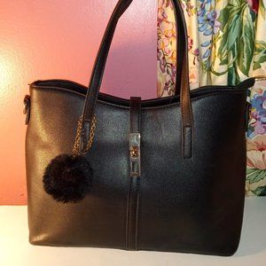 BLACK DOUBLE-SIDED SACHTEL HANDBAG WITH A BLACK POM-POM & GOLD HARDWARE